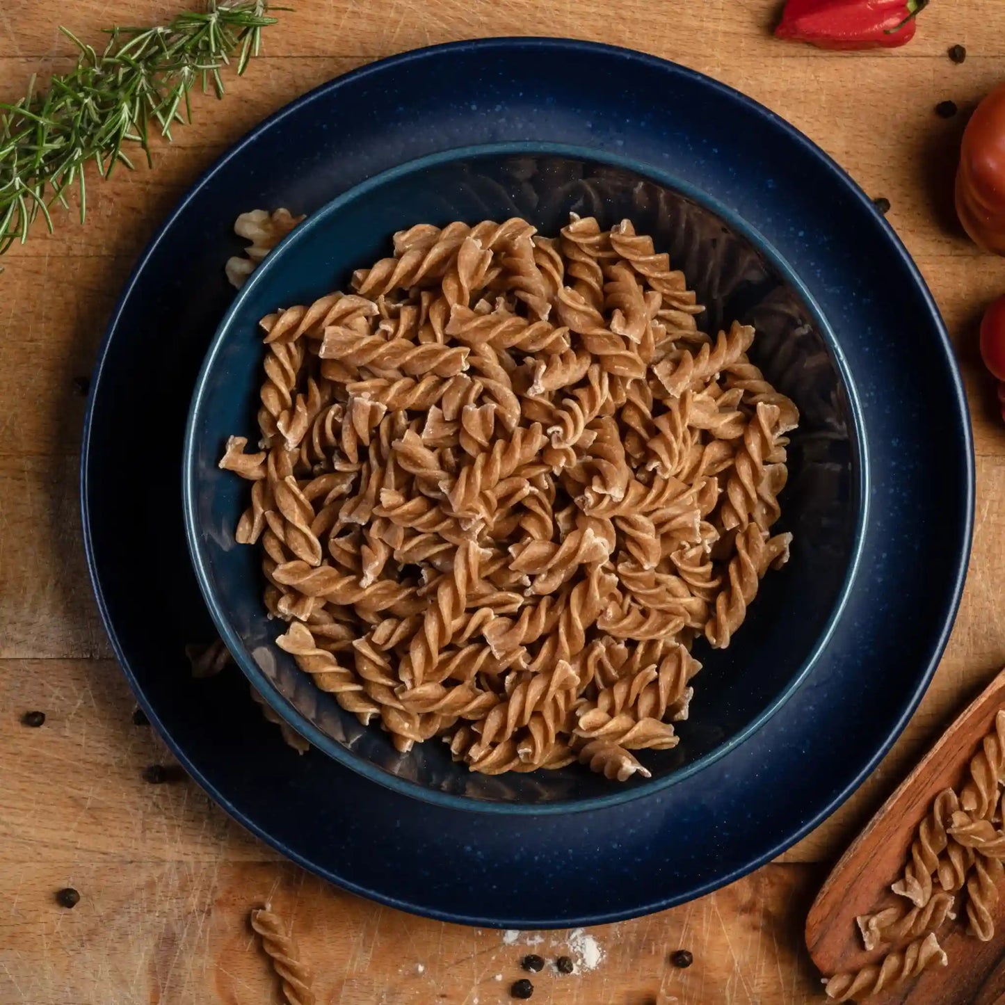 Top view of multiple pieces of uncooked Organic Einkorn Fusilli